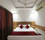 Bedroom 4 HOTEL SHAGUN ROOMS & BANQUET Surat