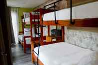 Phòng ngủ Crusoe Cabins Costa Azalea