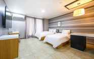 ห้องนอน 2 White Tourist Hotel