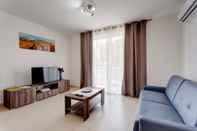 Ruang untuk Umum Modern 1BR Apartment in a Central Location