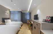 Kamar Tidur 7 Happy Lane Hotel