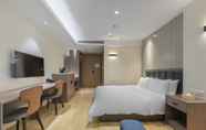 Kamar Tidur 4 Happy Lane Hotel