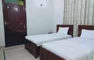 ห้องนอน 5 Cosy Inn Guest House