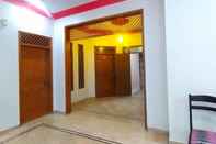 Kamar Tidur Cosy Inn Guest House