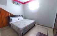 Bilik Tidur 6 Cosy Inn Guest House