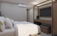 Kamar Tidur 4 Fairfield by Marriott Medellin Sabaneta