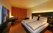 Kamar Tidur 7 The Bridgge Grand Boutique Hotel