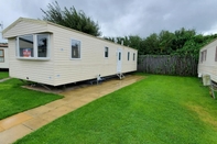 Exterior Cosy Caravan in Rhyl North Wales