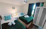 Bedroom 6 Garfield Villa-beautiful 4-bed House in Gillingham