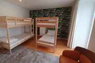Kamar Tidur Azores Inn - Family Suites Hostel