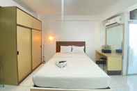 Kamar Tidur Spacious Studio Room with Sofa Bed at Emerald Towers Apartment