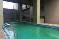 Swimming Pool Modern Look Studio Apartment at Grand Asia Afrika