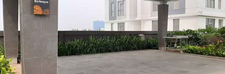 Exterior Homey Studio Apartment at M-Town Residence near Summarecon Mall Serpong