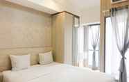 Bedroom 2 Homey Studio Apartment at M-Town Residence near Summarecon Mall Serpong