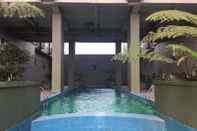 Swimming Pool Modern and Comfy Studio Room at Grand Asia Afrika Apartment