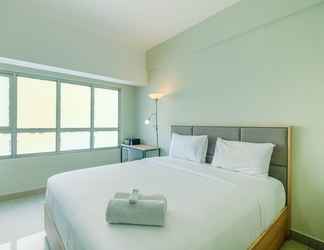 Bedroom 2 Functional and Minimalist Studio Apartment at Springlake Summarecon