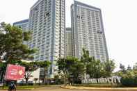 Bangunan Homey and Comfy 1BR at Casa de Parco Apartment