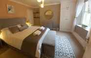 Bedroom 3 Seafront Apartment Private Garden & Free Parking