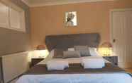 Bedroom 2 Seafront Apartment Private Garden & Free Parking