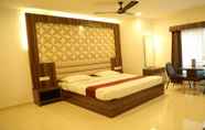 Bedroom 7 i-Roomz Hotel Shivananda