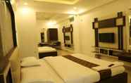 Bedroom 2 i-Roomz Hotel Shivananda