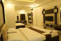 ห้องนอน i-Roomz Hotel Shivananda