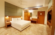 Bedroom 2 Howard Johnson by Wyndham Udaipur Roop Nagar