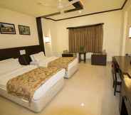 Bedroom 5 Grand Sarovar Portico