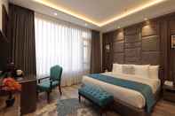 Bedroom WelcomHeritage Elysium Resort & Spa