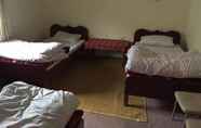 Bedroom 5 Tibet Motel