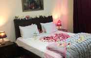 Kamar Tidur 5 Hotel Hunza White House