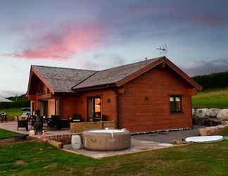 Exterior 2 Cuddfan Lodge on a Gorgeous Private Lake