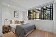 Kamar Tidur Whitfield Street Residences by Q Apartments