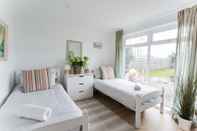 Kamar Tidur Fairlight - Charming Coastal Home on the Beach