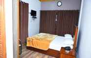 Kamar Tidur 7 Azeem International Hotel And Restaurant