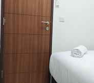 Bedroom 5 Comfort 2Br Apartment At Vida View Makassar