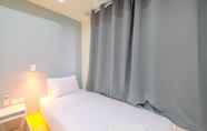 Bedroom 4 Warm And Cozy Studio Evenciio Apartment Margonda Near Ui