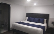Bedroom 5 Hotel American Visa Bogota