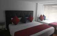 Bedroom 6 Hotel American Visa Bogota