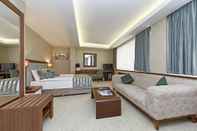 Kamar Tidur Royal Sweet Hotel