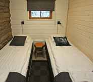 Bedroom 3 Kuukkeli Log Houses Aurora Cabin - Jaspis
