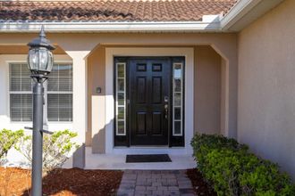 Exterior 4 Beautiful 5Bd Single Family w Game Room 106 Lake Wilson Preserve