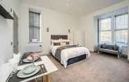 Bedroom 2 Exquisite Serviced Studio With Private Parking