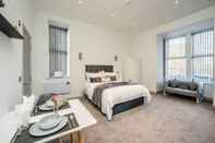 Bedroom Exquisite Serviced Studio With Private Parking
