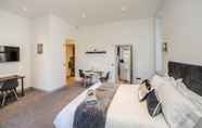 Bedroom 4 Exquisite Serviced Studio With Private Parking