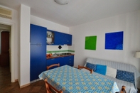 Bedroom Le Dimore di Nettuno 2 With Pool