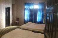 Kamar Tidur Hotel Happy Hut