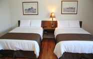 ห้องนอน 7 Coach House Inn