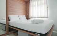 Bedroom 4 Restful and Tidy 2BR at Green Pramuka City Apartment