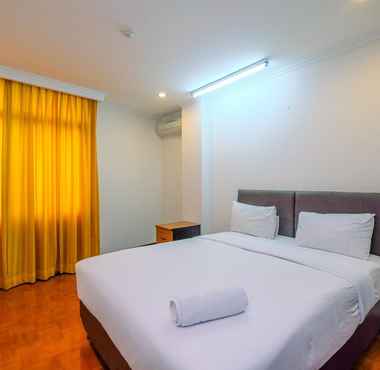 Bedroom 2 Luxurious and Spacious 2BR at Kusuma Chandra Apartment